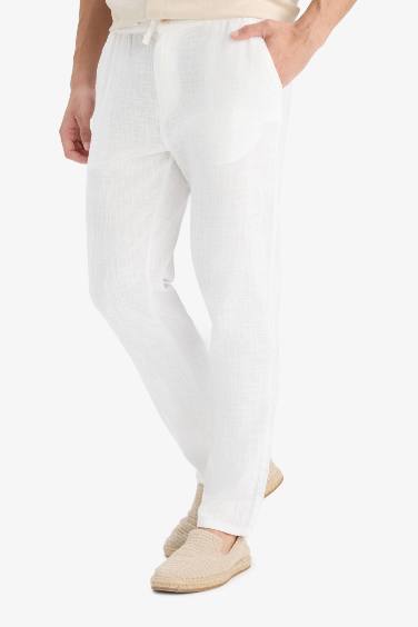 Pantalon slim à jambes droites avec poches