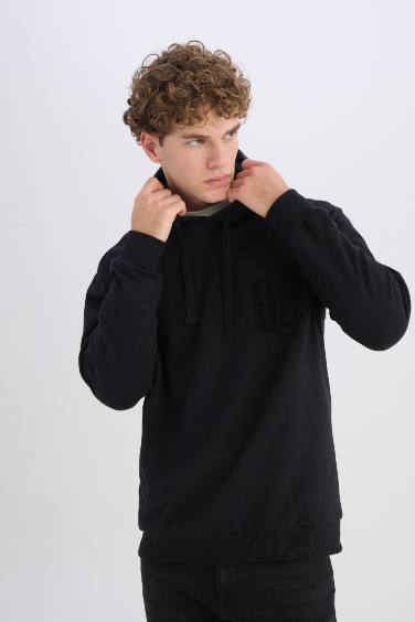 سويت شيرت قصة مريحة بغطاء للرأس