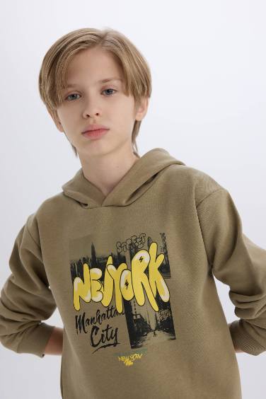 سويت شيرت اولادي تقيل قصة عادية بجيب