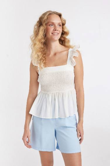 Fitted White Crinkle Sleeveless Blouse