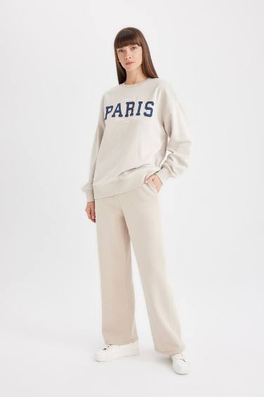 Свитшот оверсайз с круглым вырезом с принтом