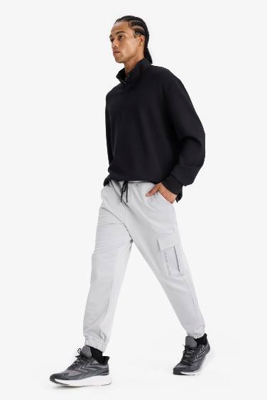 DeFactoFit Sporcu Jogger Eşofman Altı Standart Fit Üç Cepli Beli Bağcıklı Lastikli Paça