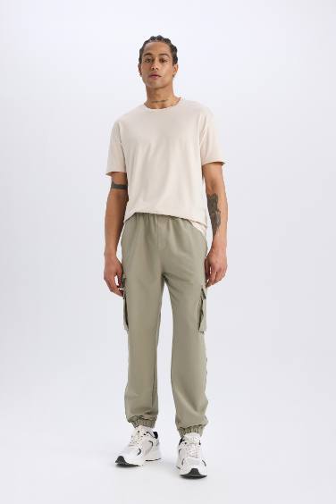 DeFactoFit Sporcu Jogger Eşofman Altı Slim Fit Dar Kesim Dokuma Kargo Cepli Standart Paça