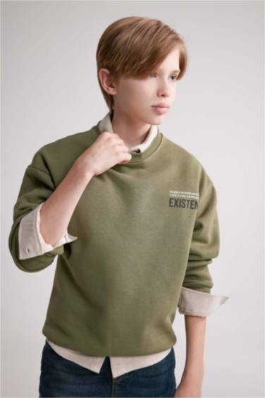 سويت شيرت واسع برقبة مستديرة