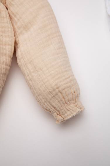 طقم بيبي بناتي كولون وجمبسوت فلورال موسلين مطرز - قطعتين