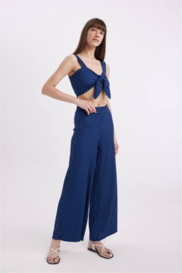 بنطرون منقط منسوج وايد ليج برجل واسع