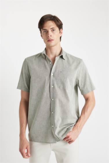 قميص بولو كتان نص كم قصة عادية