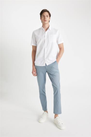 قميص بولو ابيض كتان نص كم قصة عادية