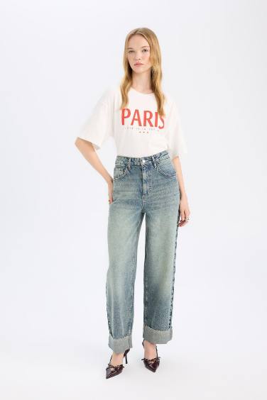 سروال جينز باجي فيت بحافة مطوية وخصر عالي