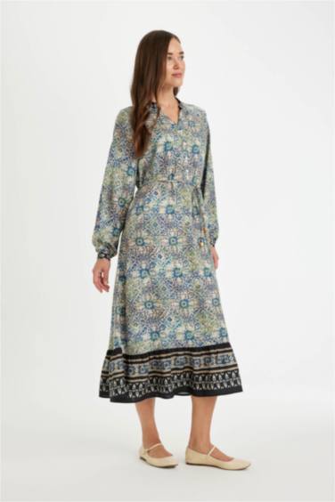 فستان طويل قصة عادية بياخة مستديرة