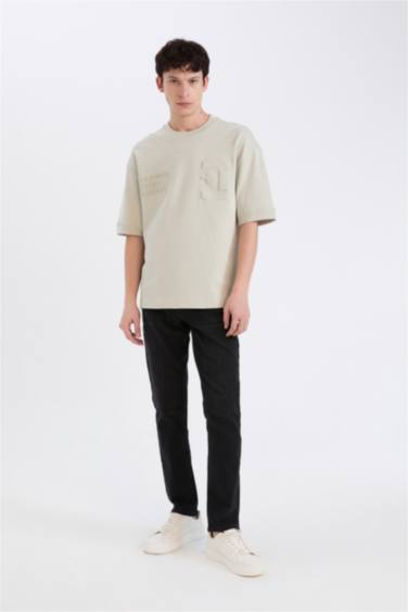 تيشيرت نص كم قصة فضفاضة بياقة مستديرة