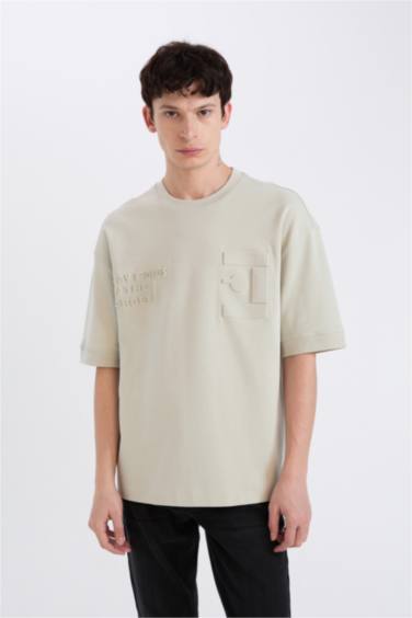 تيشيرت نص كم قصة فضفاضة بياقة مستديرة