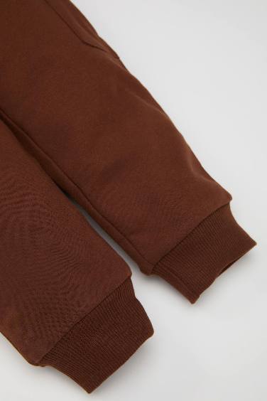 بنطلون سويت بانتس بيبي اولادي كارجو قصة عادية بجيب وأستك من تحت