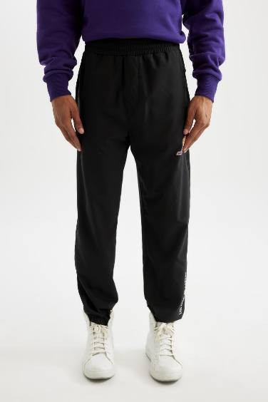 DeFactoFit NBA Los Angeles Lakers Dokuma Jogger Eşofman Altı Slim Fit Dar Kesim Cepli Ekstra Dar Paça