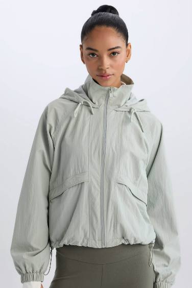 Sweat à capuche imperméable à fermeture zip et poches