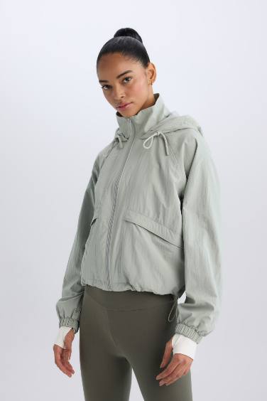Sweat à capuche imperméable à fermeture zip et poches