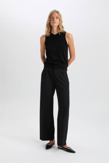 بلوفر تريكو سليم فيت برقبة مستديرة