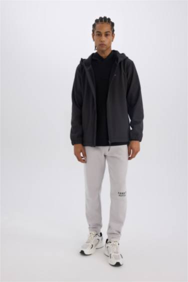 Defactofit Su İtici Regular Fit Kapüşonlu İçi Polarlı Fermuarlı Softshell Yağmurluk