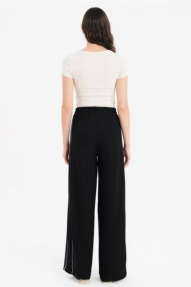 بنطرون قصة مستقيمة برجل عادي