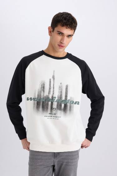 سويت شيرت اوفر سايز مطبوع بياخة مستديرة