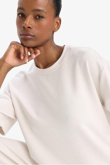 تي شيرت نسيج مشروط اوفر سايز بياقة مستديرة