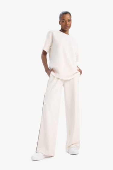 تي شيرت نسيج مشروط اوفر سايز بياقة مستديرة