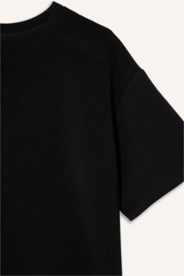 تيشيرت رياضي نص ردن اوفر سايز بياخة مستديرة من DeFactoFit