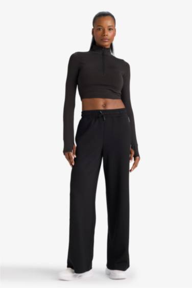 بنطرون رياضي منسوج برجل واسع وايد ليج