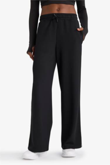 بنطرون رياضي منسوج برجل واسع وايد ليج