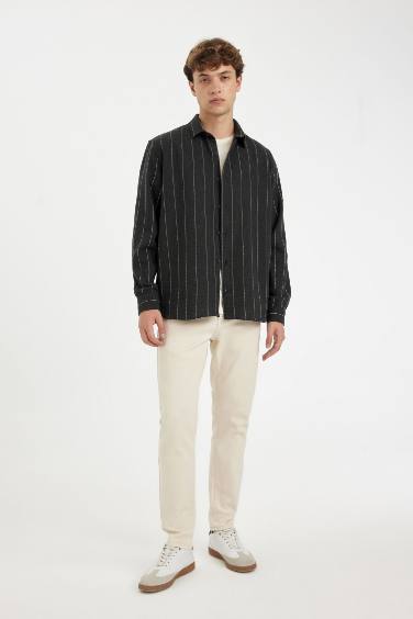 قميص بولو مخطط اسود كم طويل قصة مريحة