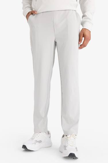 DeFactoFit Slim Fit Dar Kesim Standart Paça Multifonksiyonel Ultrastrech Sporcu Jogger