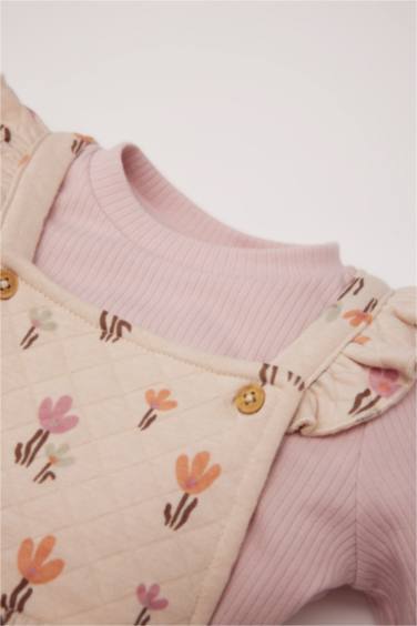 طقم من قطعتين فستان زهري مبطن برقبة مستديرة و بودي سامبل