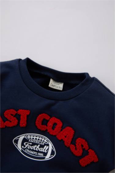 طقم بيبي اولادي سويت شيرت وسويت بانتس بطبعة شعار قصة عادية - قطعتين