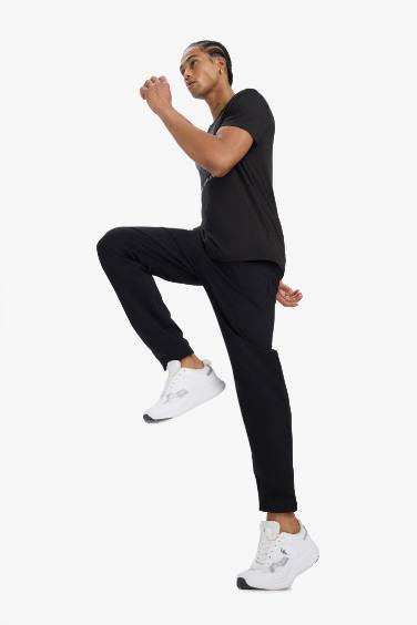 DeFactoFit Slim Fit Dar Kesim Çift Cepli Standart Paça Esnek Multifonksiyonel Sporcu Jogger