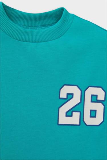 تيشيرت بيبي ولادي نص ردن بطبعة شعار قصة عادية