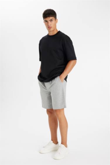 شورت برمودا بيزك قصة عادية