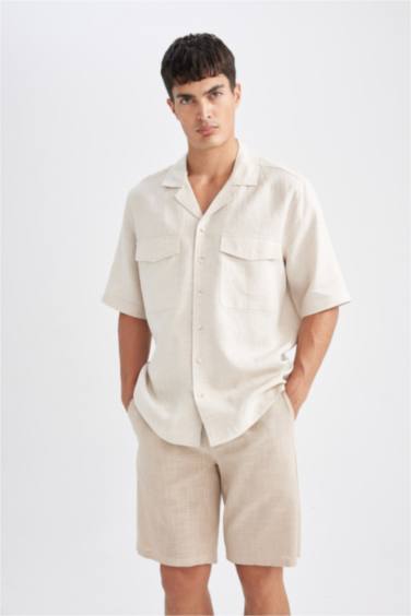 Short Bermuda en coton à taille élastique et poches