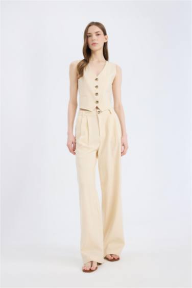 Широкие брюки из смесового льна с высокой посадкой и тремя карманами