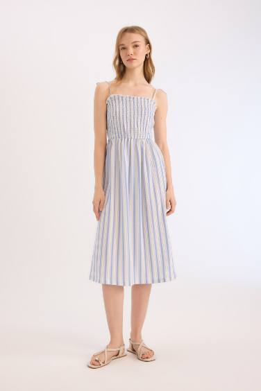 فستان نص كم ميدي مخطط بحمالات