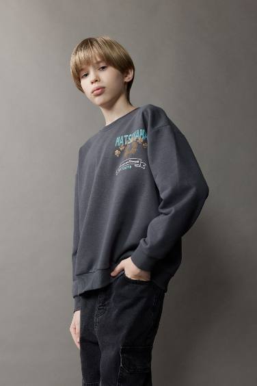 سويت شيرت ولادي اوفر سايز بطبعة من الخلف