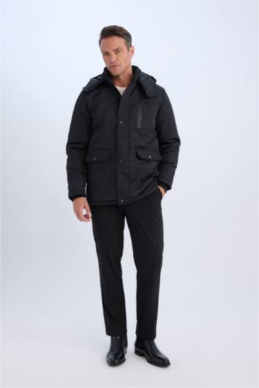 Manteau déperlant à capuche avec poches et fermeture éclair