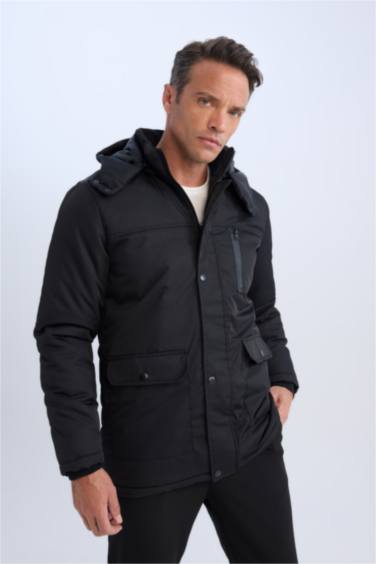 Manteau déperlant à capuche avec poches et fermeture éclair