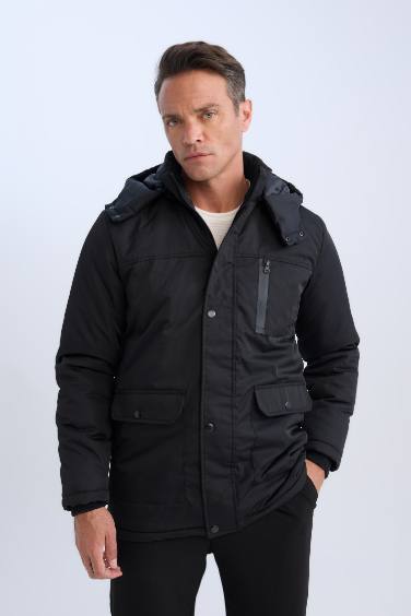 Manteau déperlant à capuche avec poches et fermeture éclair