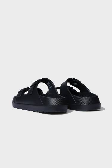 شبشب حريمي إيفا أسود بكعب مسطح بشريط مزدوج