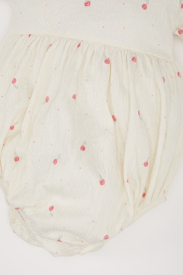 Body fleuri à manches longues et boutons-pression pour bébé fille