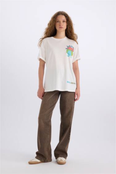 تيشيرت نص ردن اوفر سايز بطبعة من الخلف من كيث هارينج