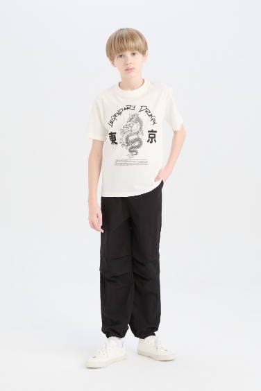 Ұлдарға дөңгелек жаға басып шығарылған қысқа жеңді Қысқа жеңді футболка