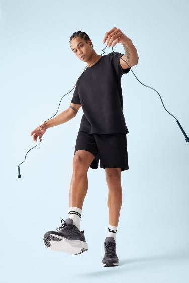 شورت رياضي قصة عادية مطبوع بسحاب من DeFactoFit