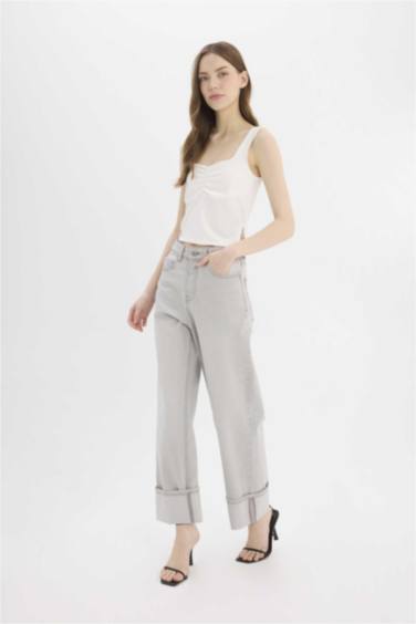 Брюки джинсовые с высокой талией и отворотами, расслабленного кроя