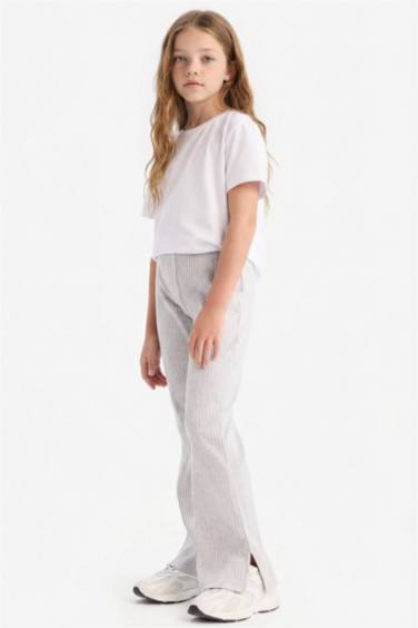 Детские леггинсы из ребристой ткани с клешированными штанинами